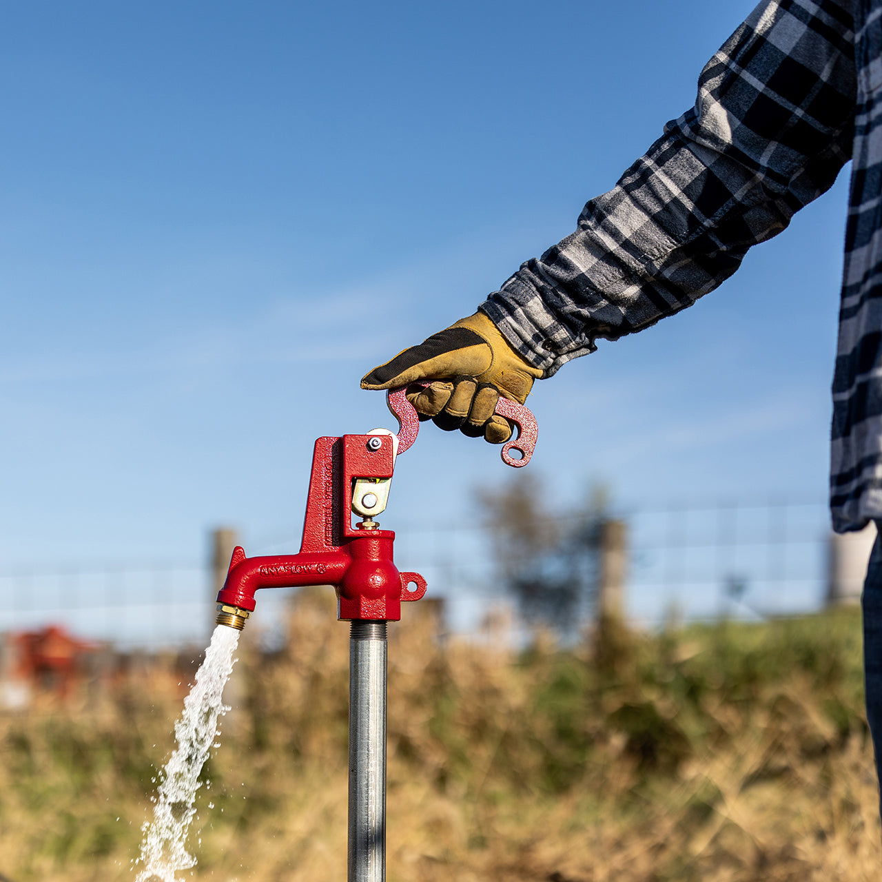 A Merrill Any Flow Frost Proof Hydrant in use.